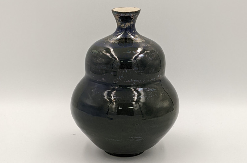 Deep blue vase with narrow top